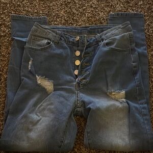 Distressed Blue Denim Jeans